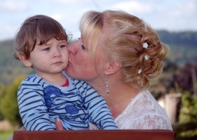 Samantha kisses her little Charlie.